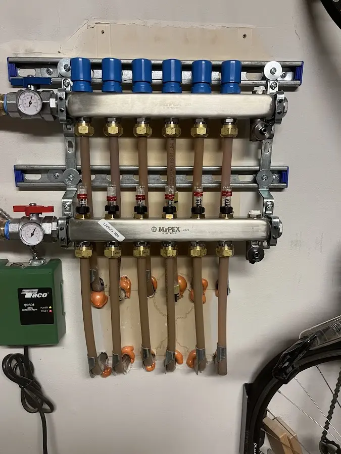 Plumber performing Gas Line Installation at a residential property in LaSalle